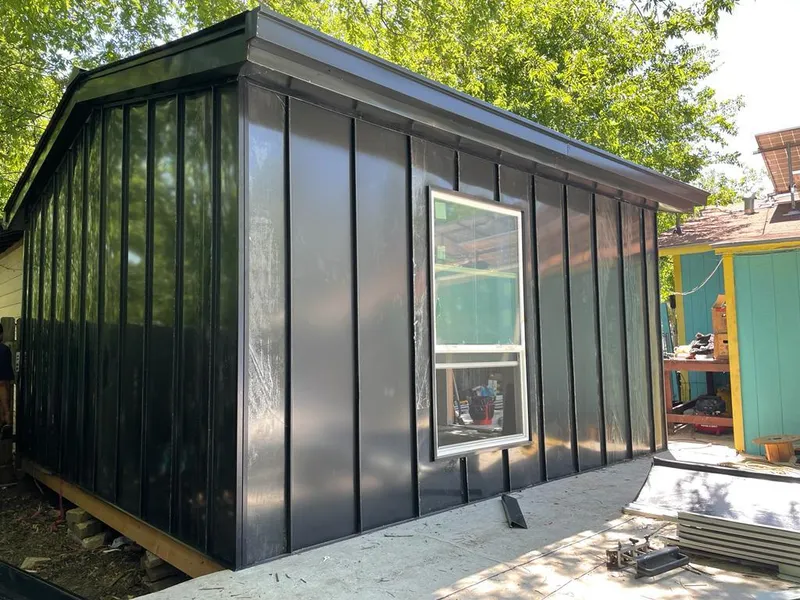 Black standing seam metal wall panels for Metal Roof Installation in McCook