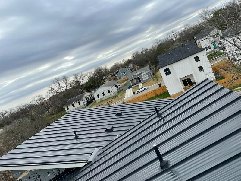 Standing seam metal roof panels with vents for Skylight Repair in McCook